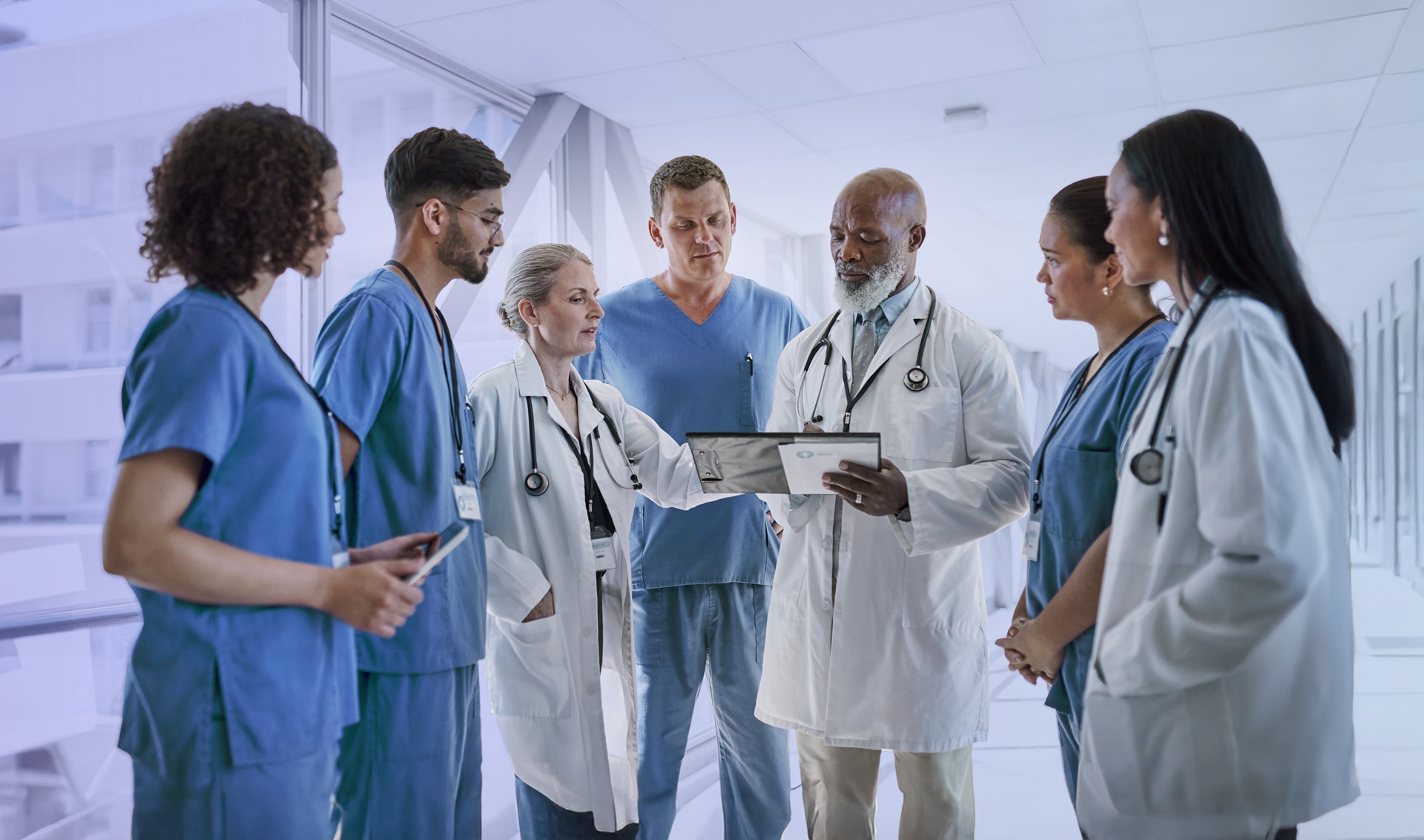 Standing Group of Physicians in Hallway